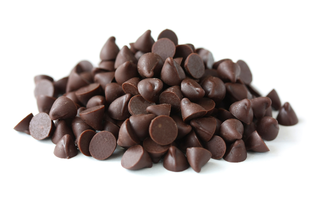 bigstock-chocolate-chips-on-white-backg-26006918